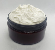 Load image into Gallery viewer, Whipped Mango Hair Butter -Our rich and creamy mango butter is terrific for all natural hair styles. It moisturizes, conditions, and gives protection from the elements while softening and adding a luxurious sheen to your tresses. Eight Ounce Jar. Ingredients - mango butter, refined shea butter, vegetable glycerin, extr…
