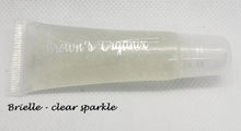 Load image into Gallery viewer, Brown's Organix vegan and gluten free lip gloss will moisturize your lips with luxurious emollients while providing a beautiful shine with just a kiss of color.