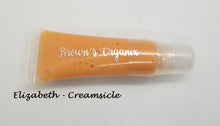 Load image into Gallery viewer, Brown's Organix vegan and gluten free lip gloss will moisturize your lips with luxurious emollients while providing a beautiful shine with just a kiss of color.