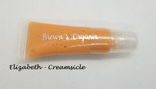 Load image into Gallery viewer, Brown&#39;s Organix vegan and gluten free lip gloss will moisturize your lips with luxurious emollients while providing a beautiful shine with just a kiss of color.
