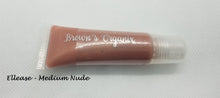 Load image into Gallery viewer, Brown&#39;s Organix vegan and gluten free lip gloss will moisturize your lips with luxurious emollients while providing a beautiful shine with just a kiss of color.
